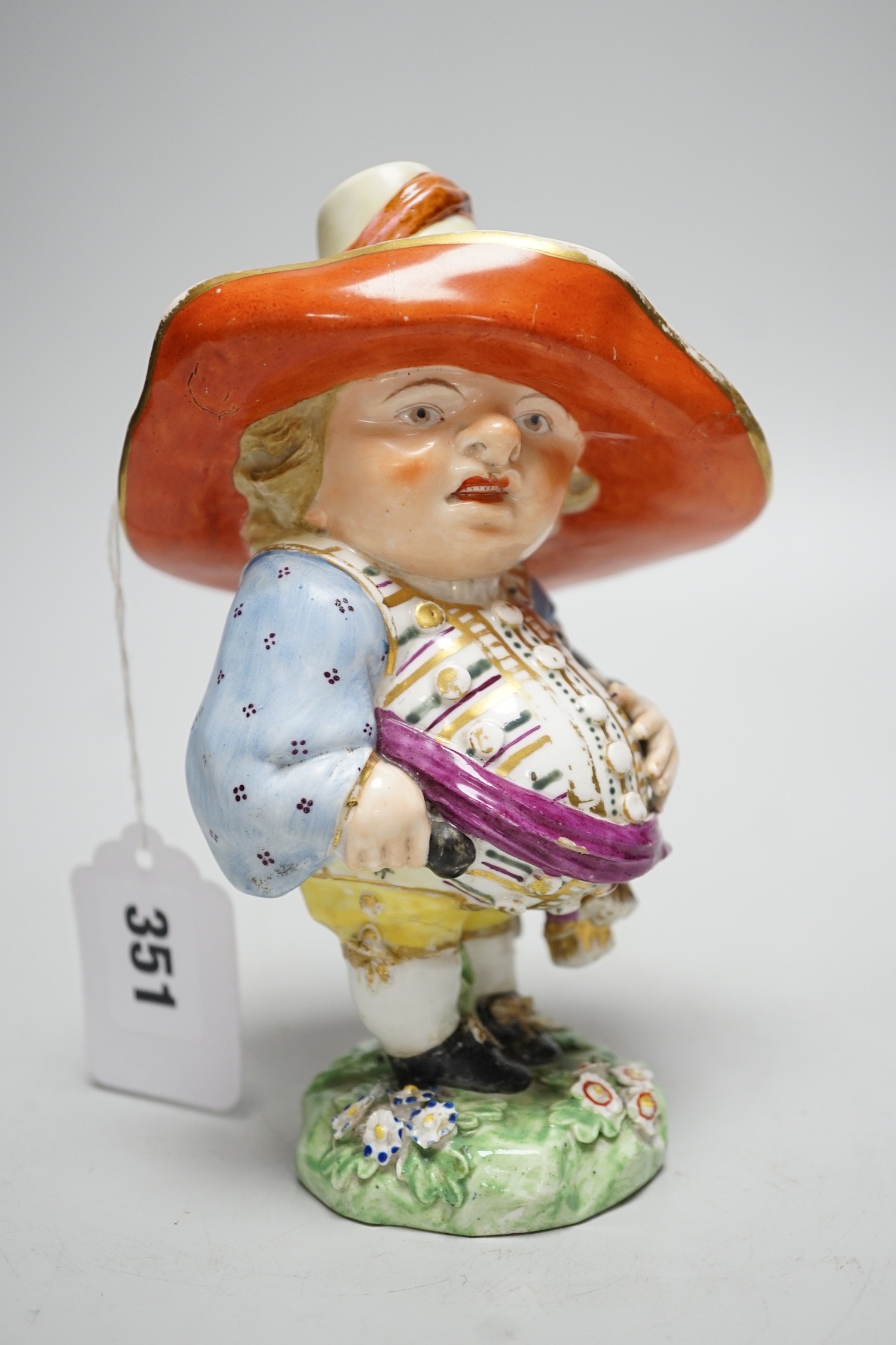 A Derby Mansion House Dwarf holding his large belly incised 227, star mark for Issac Farnsworth c.1790-1800, 17cms high